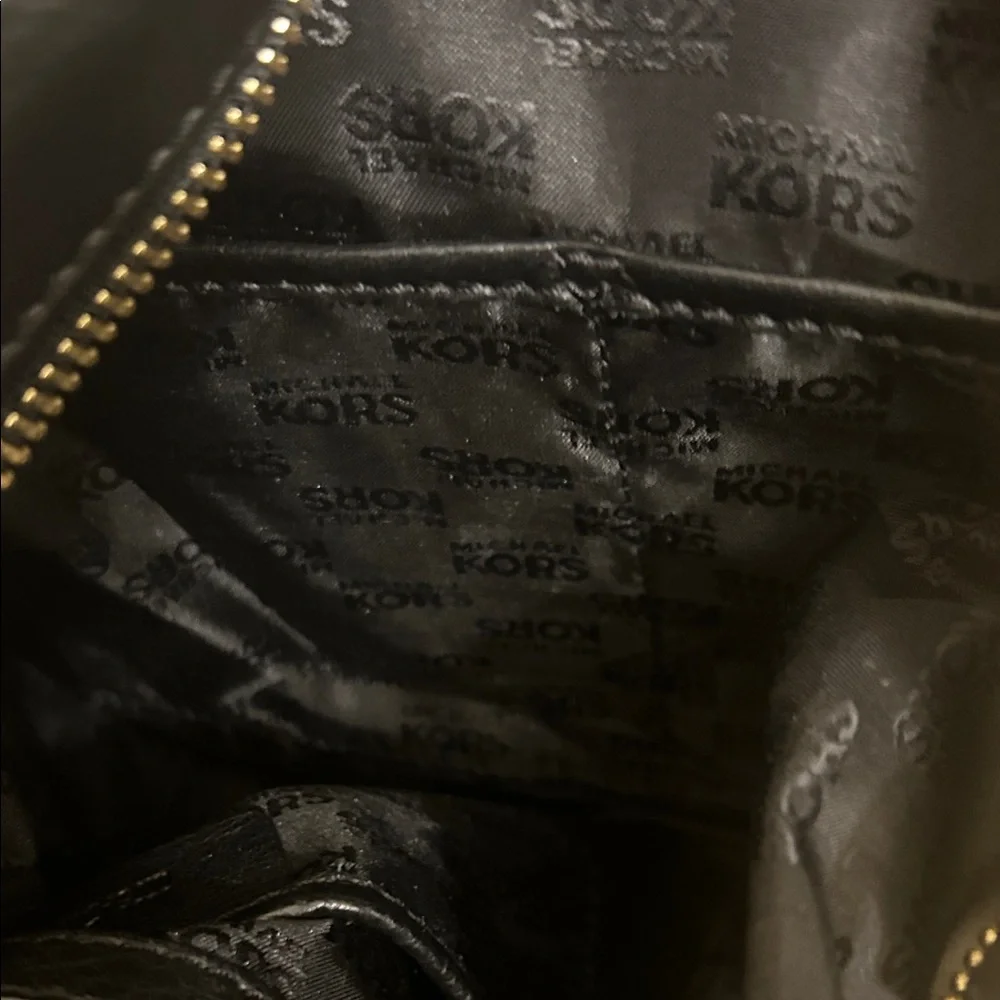 Michael Kors Black Hobo Bag with Gold Accents